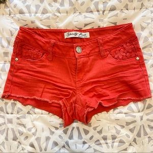 Lace embellished orange denim shorts